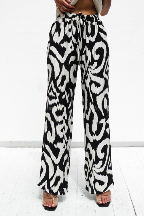 Spodnie czarno białe Eve